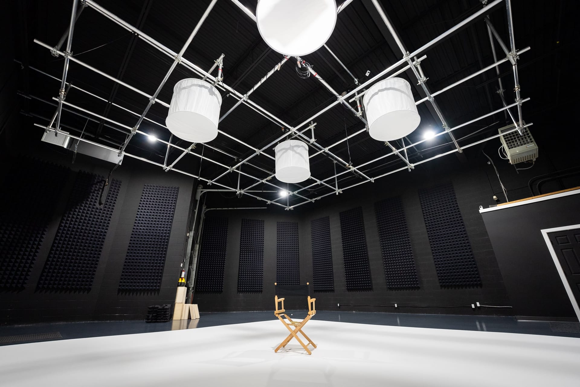 Main soundstage at Viva Studios with a white cyc wall and black ceiling